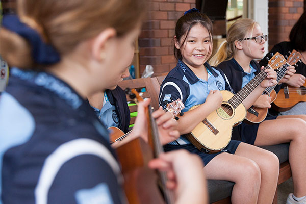 Students at St MIchael's Catholic Primary School Daceyville playing ukeleles
